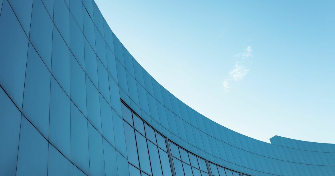 corporate-building-blue-sky-background-with-isolated-place-text corporate-building-blue-sky-background-with-isolated-place-text